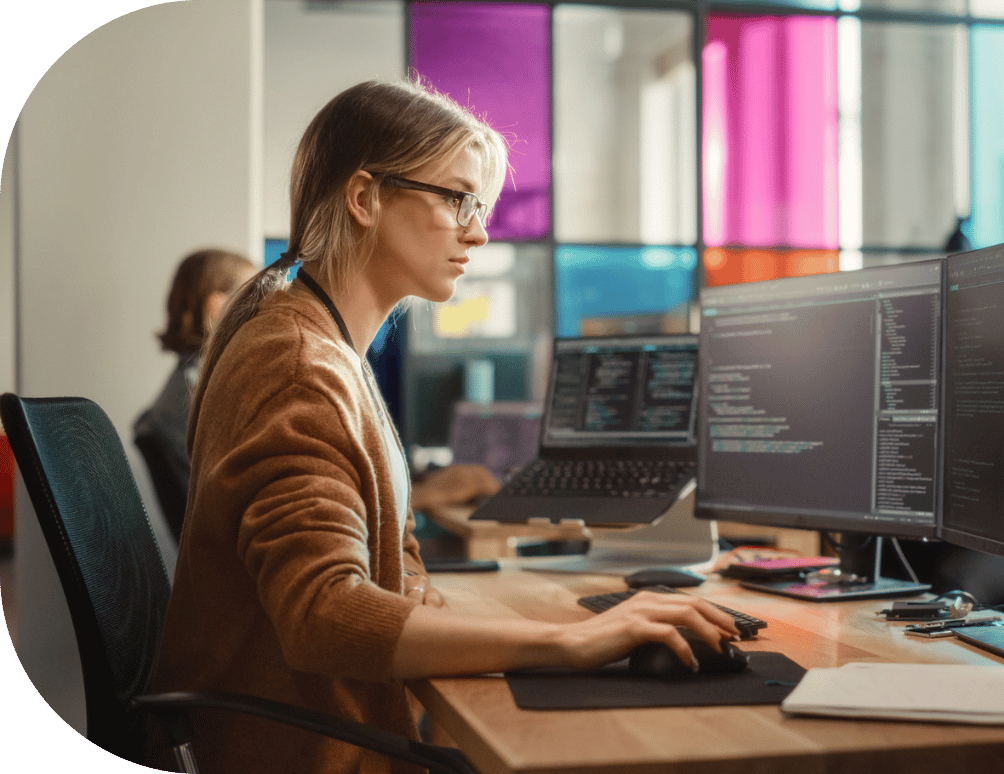 A woman working on a coding project
