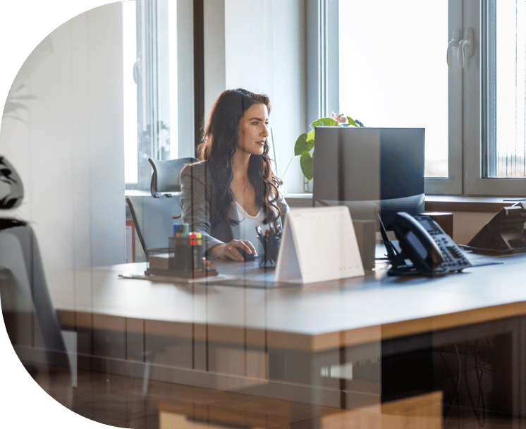 A woman working on her computer