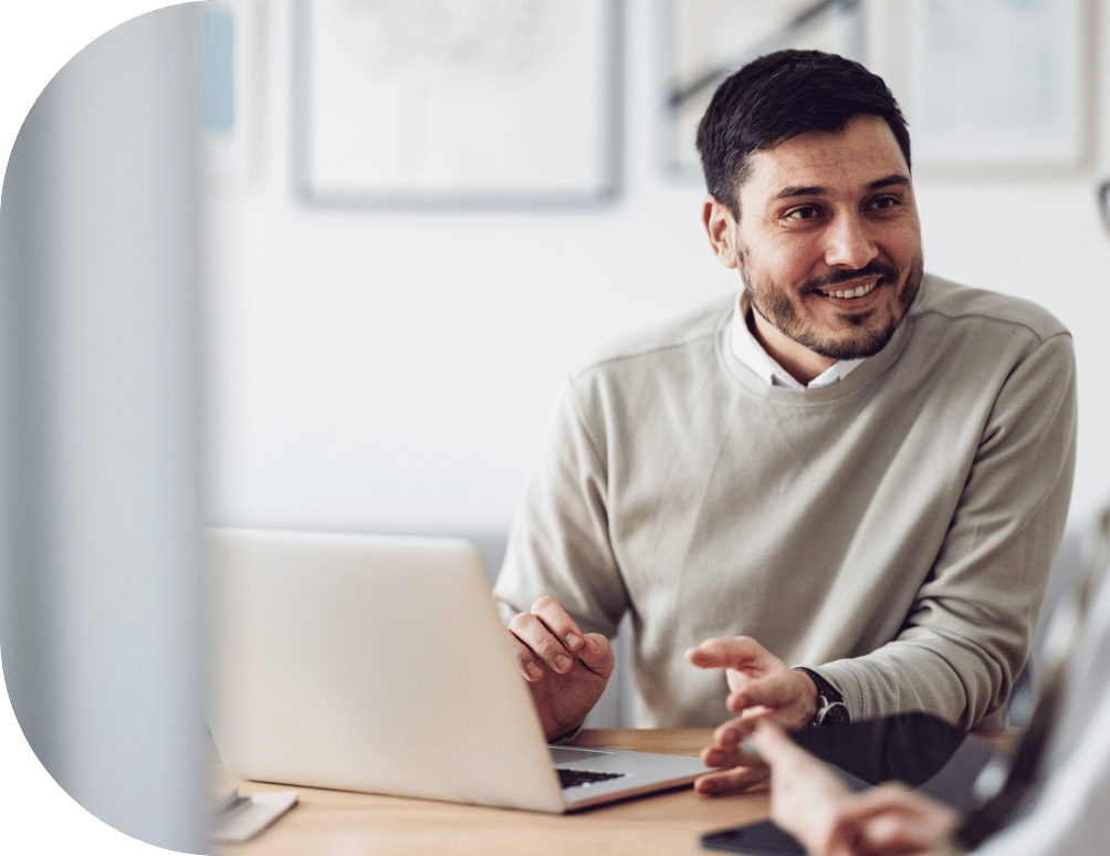 A man talking in an office
